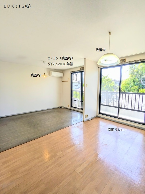 熊本市西区八島２丁目のアパートの居間・リビング