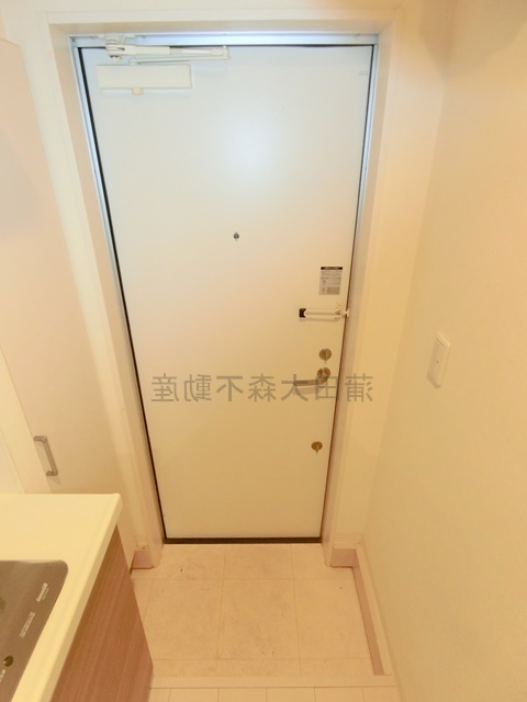 ウェルスクエア蒲田EASTの玄関