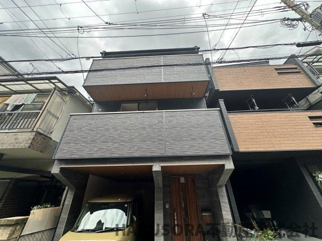 寝屋川市河北中町22-3　3階建の外観