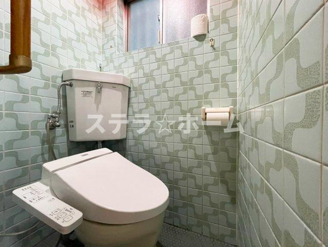 毛馬町1 中古戸建のトイレ|落ち着いた色調のトイレです