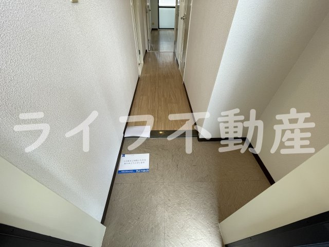 ハピネスふせの玄関