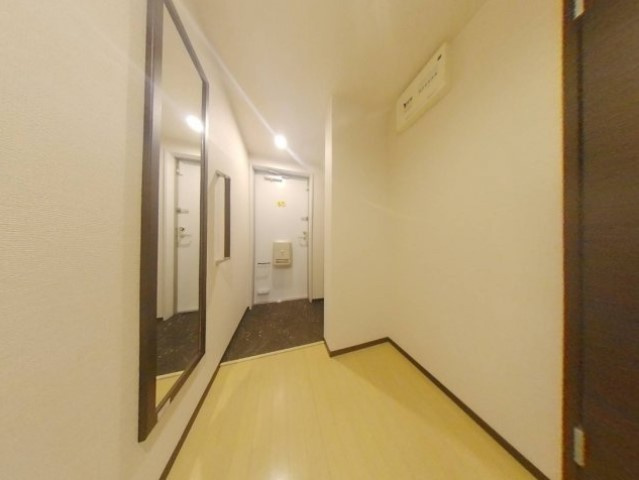 クレイノサンライズステージの玄関