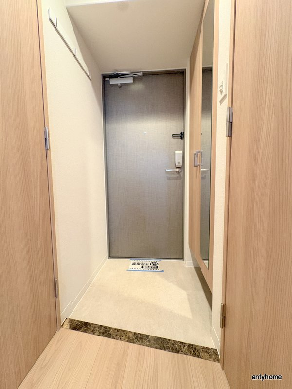 エスリードレジデンスザ・グラン大阪福島アクシス　仲介手数料無料の玄関