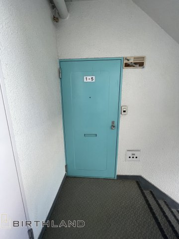 勤住桑野マンションAの玄関