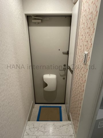 ユナイト日の出町パルメザンロードの玄関