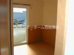 船橋市前貝塚町のアパートの居間・リビング