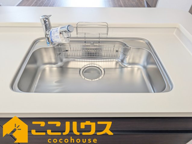 豊見城市豊見城　リーブルガーデン　新築戸建て　全4棟　1号棟のキッチン|洗い物のしやすいワイドシンク
