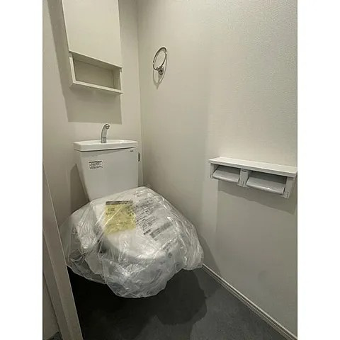 神戸市中央区中山手通７丁目の賃貸マンションのトイレ