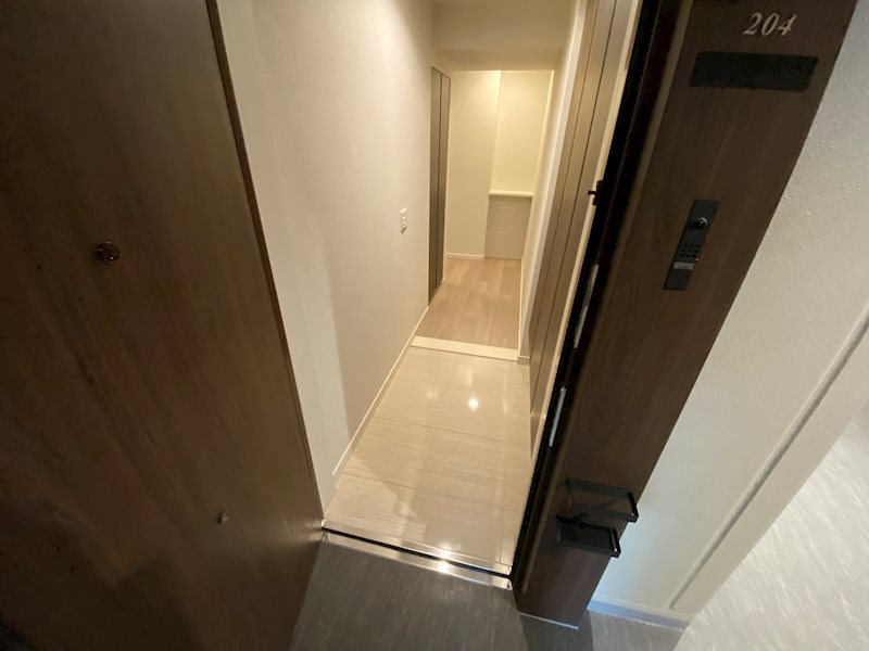 神戸市中央区海岸通１丁目の賃貸マンションの玄関