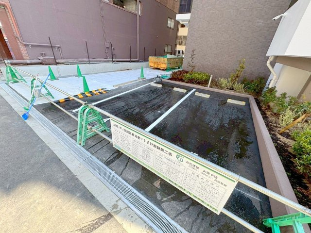プランドール新北野の駐車場