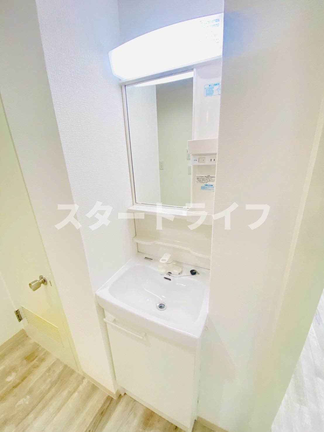 大阪市東淀川区下新庄４丁目の賃貸マンションの洗面所