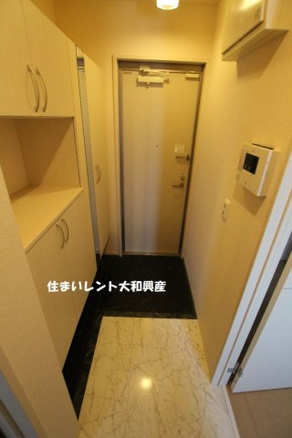 ブライトガーデン新磯野の玄関