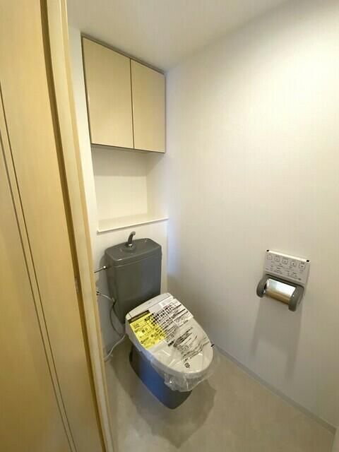 ヒルズ池尻東山公園のトイレ|落ち着いた色調のトイレです