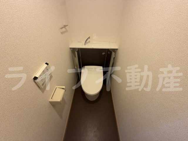 アルカディアⅡのトイレ|落ち着いた色調のトイレです