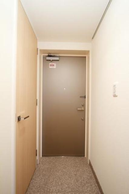 ユニゾンタワーの玄関|※写真は同タイプ住戸です。
