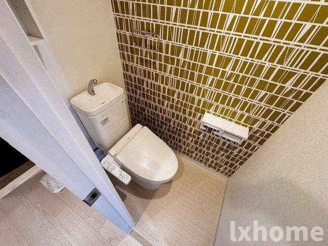 ガーデンクォーツ摂津正雀のトイレ|落ち着いた色調のトイレです