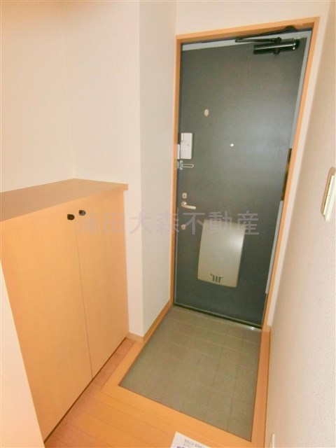 リースランド矢口A棟の玄関