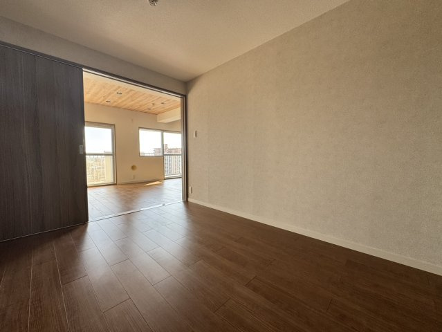 コープ宇部松山町マンションの洋室
