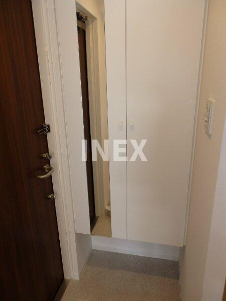 横浜市神奈川区神奈川２丁目の賃貸マンションの玄関