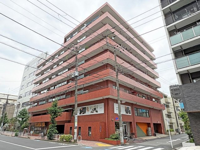ジョイフル門前仲町第2  の外観|重厚感のあるレンガ調タイルが印象的なマンション外観。角地に建ち、存在感のある佇まいです。
