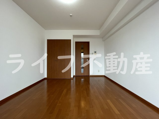 グランシス高井田の洋室