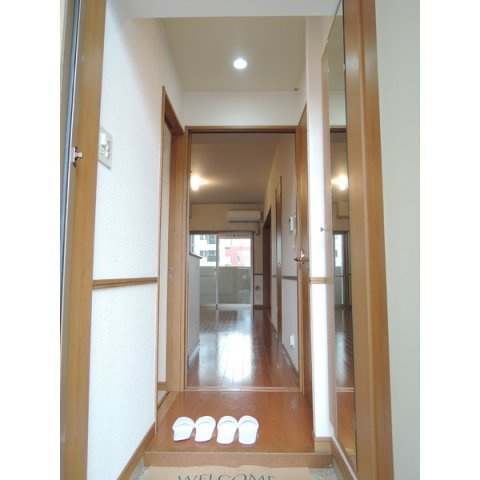 福岡市博多区堅粕５丁目の賃貸マンションの玄関