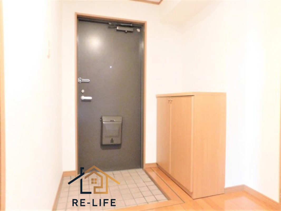 那珂川市今光３丁目の賃貸マンションの玄関