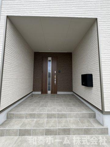 クレイドルガーデン藍住町東中富第1の玄関