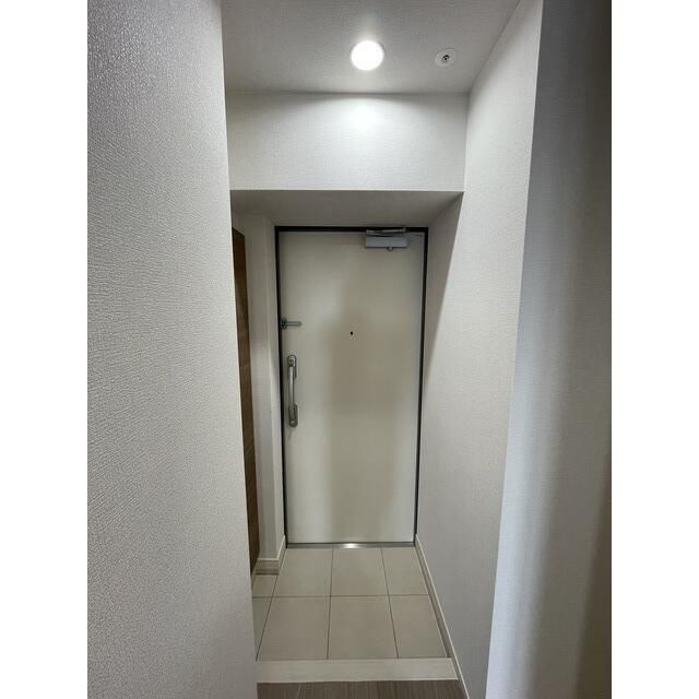 アルファコート西川口１９の玄関