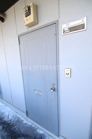 ハイツコスモスの玄関