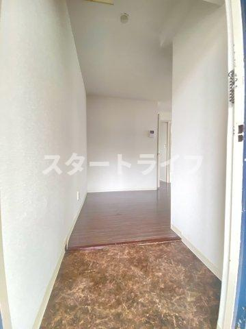 大阪市淀川区木川西１丁目の賃貸マンションの玄関