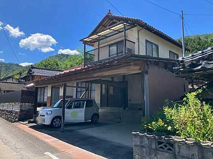 佐伯区湯来町大字麦谷　中古戸建の前面道路含む現地写真