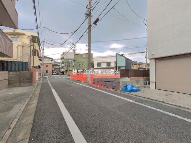練馬区豊玉中2丁目　両面道路　建築条件なし売地の前面道路含む現地写真