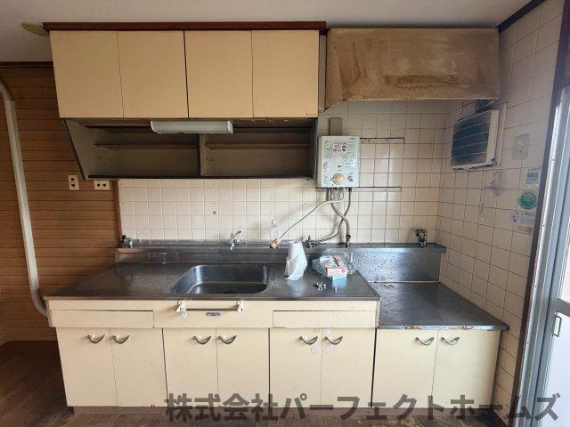 釈尊寺第一住宅第14号棟のキッチン|コンパクトなキッチンで掃除もラクラク