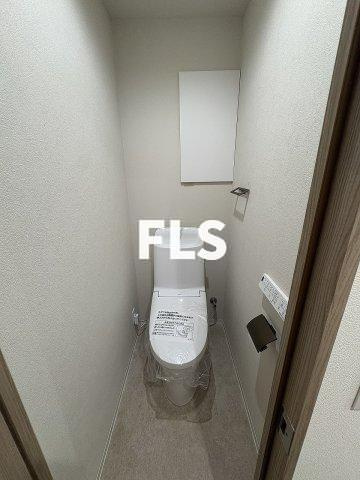 荒川区西日暮里１丁目の賃貸マンションのトイレ