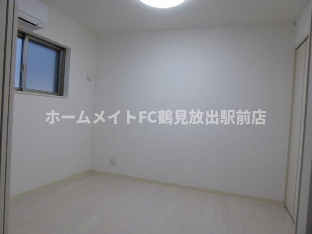 クリエオーレ鴻池徳庵町の洋室