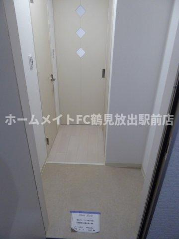 クリエオーレ鴻池徳庵町の玄関