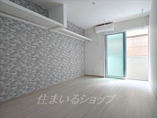 広島市安佐北区口田南２丁目のアパートの居間・リビング|エアコン・室内物干しあり