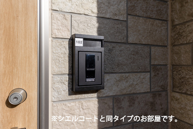 稲城市百村のアパートのセキュリティ