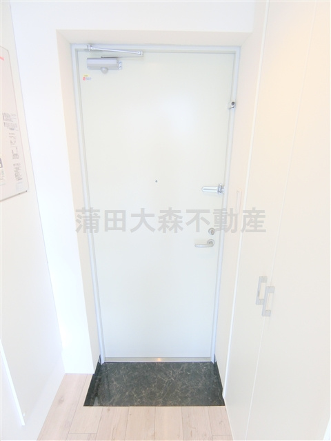 クレッシェンド平和島の玄関