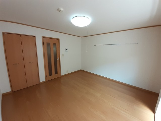 狛江市中和泉３丁目のアパートの寝室