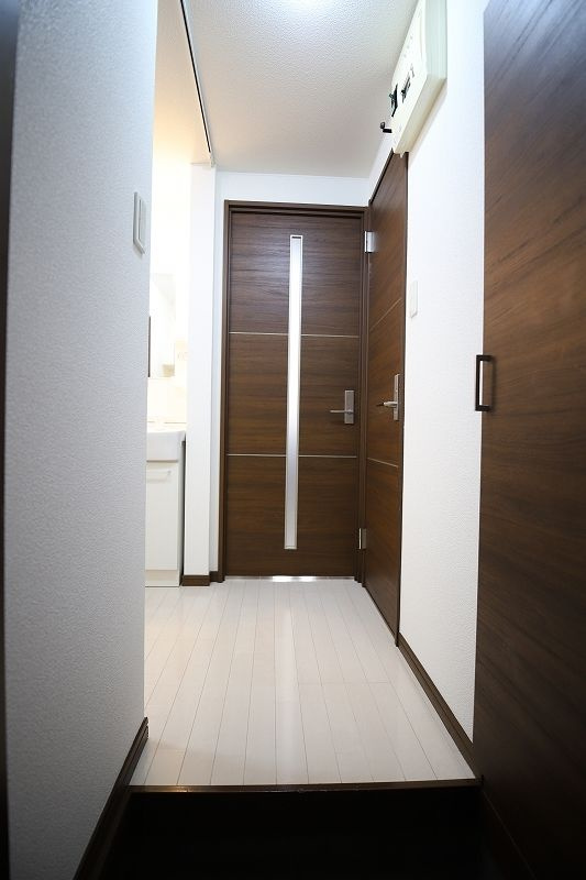 ロザリオカーサⅦ 387の玄関
