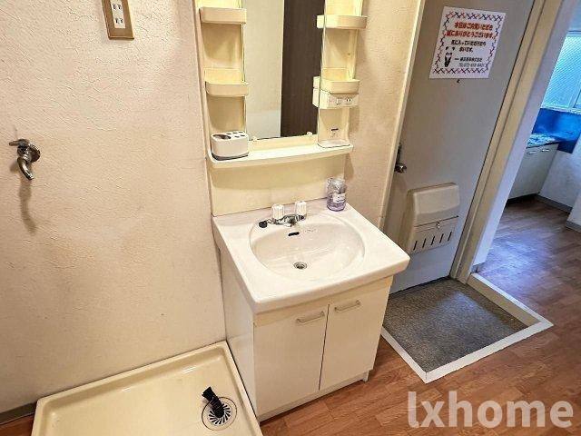 春日マンションの洗面所|コンパクトで使いやすい洗面所
