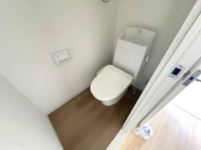 神戸市中央区熊内町４丁目の賃貸マンションのトイレ