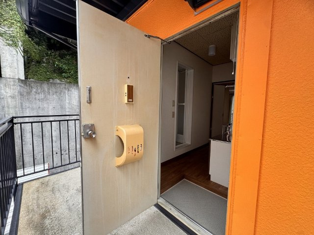 TAMAパレス高梨の玄関