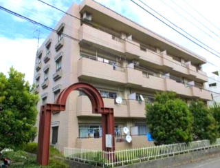 稲城市東長沼の賃貸マンションの外観