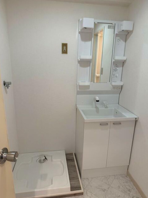 稲城市東長沼の賃貸マンションの洗面所