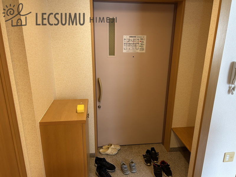 クオリティライフ壱番館の玄関