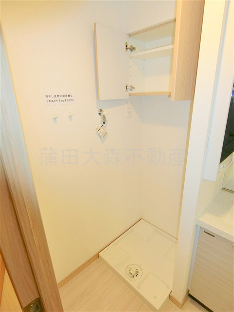 ルーブル蒲田南七番館の設備|棚収納付の室内洗濯機置場