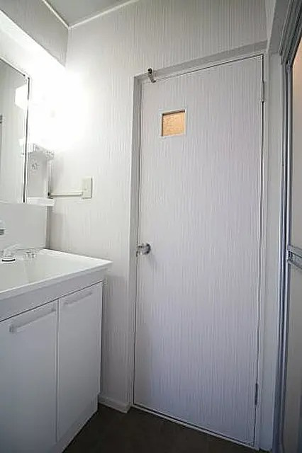 神戸市灘区弓木町５丁目の賃貸マンションの洗面所